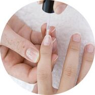 applying nail polish to treat nail fungus